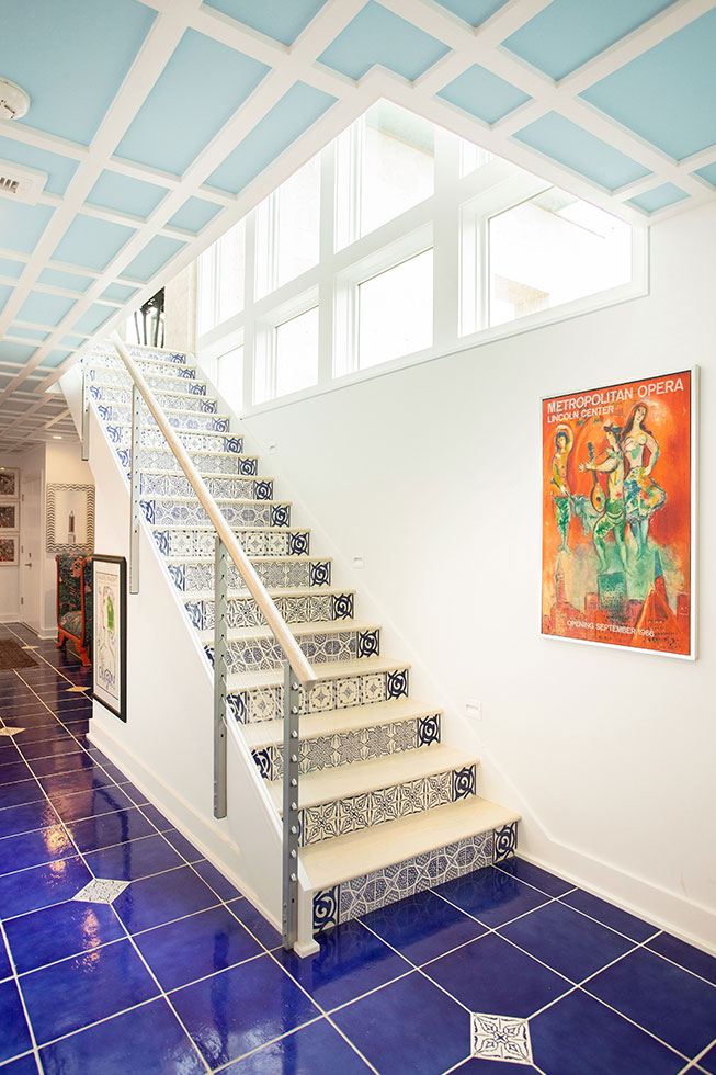 Interior custom designed and constructed stairway inside a coastal luxury home constructed by Gwathmey Residential Group
